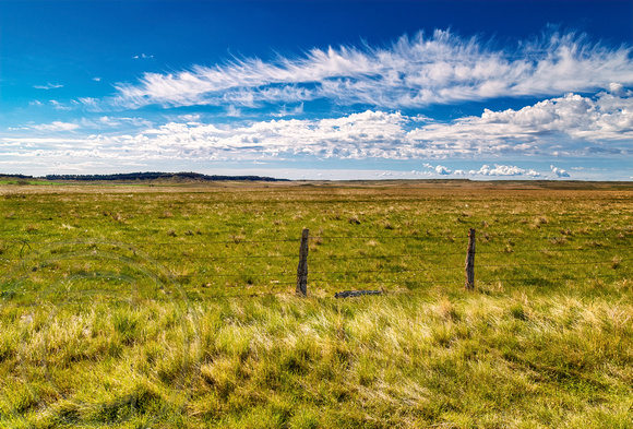 Montana Landscape with fence and clouds