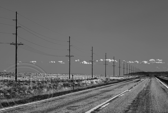 Montana Landscape with telephone poles and clouds