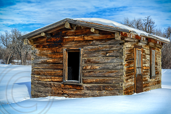 Log Cabin by Miles City