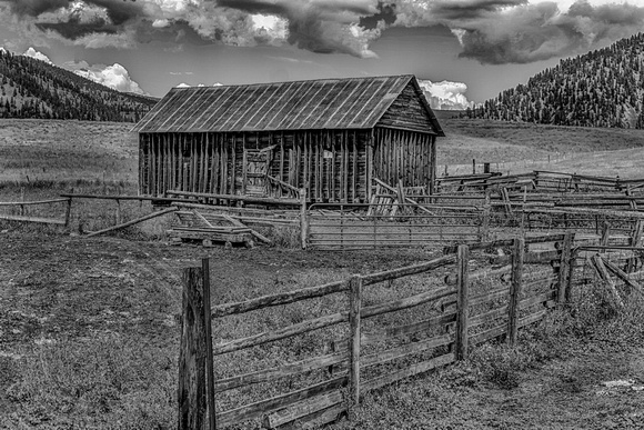 Fence and wooden barn