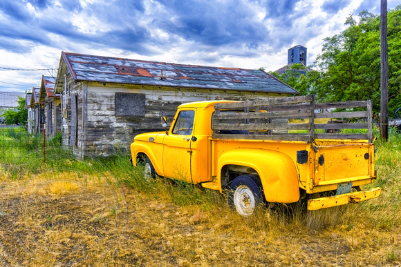 Landscape with yellow pickup-
